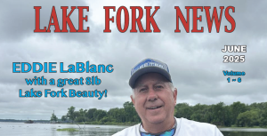 Lake Fork News A photograph captures Eddie LaBlanc, grinning broadly beneath a dark cap, proudly holding up an impressive 8-pound largemouth bass as he poses on the shores of Lake Fork in Texas. In the background, dense green trees line the lake’s edge beneath a dramatic cloudy sky. Text overlays announce "LAKE FORK NEWS," highlight Eddie’s accomplishment—"EDDIE LaBlanc with a great 8lb Lake Fork Beauty!"—and note this image features in the publication’s “Online Edition June 2025 Volume 1~6.”. Lake Fork, TX