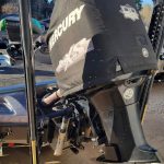 Lake Fork News A close-up shot shows a gleaming black Mercury Pro XS outboard motor, partially shrouded by a branded protective cover, mounted on the stern of a boat in Perth’s S2 Marine dealership lot. The vessel rests securely atop a trailer under bright daylight, highlighting S2 Marine’s launch of premium Mercury Repower options—positioning the powerful new lineup as Western Australia’s latest destination for outdoor adventure enthusiasts. Lake Fork, TX