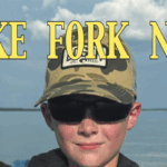 Lake Fork News Lake Fork News Online Edition: Young boy in camo hat and sunglasses holds fish lakeside. “SEPTEMBER 2025,” “Volume 1 ~ 9.” Bass graphic left. Lake Fork, TX