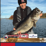 Lake Fork News On Lake Fork’s shore, a smiling angler in black cap and jacket displays a large fish on Lake Fork News’ Dec 2025 Christmas cover. Lake Fork, TX